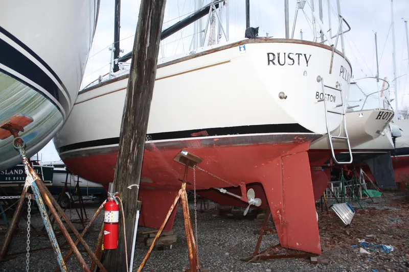 Slide: The Image of 1979 Pearson 323 sailboat named "Rusty" on dry dock, Boston. - 6