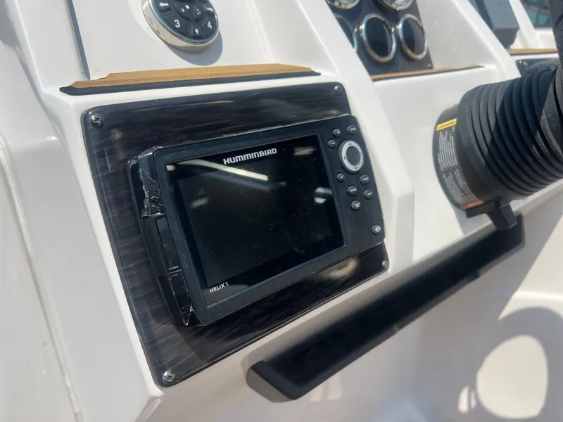 Slide: The Image of 2023 Starcraft SVX 231 OB DH dashboard with Humminbird Helix 5 fish finder. - 28
