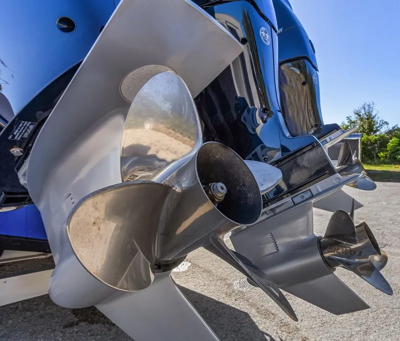 Slide: The Image of Close-up of 2023 Renegade 38 Open boat propellers, showcasing sleek design and engineering. - 14