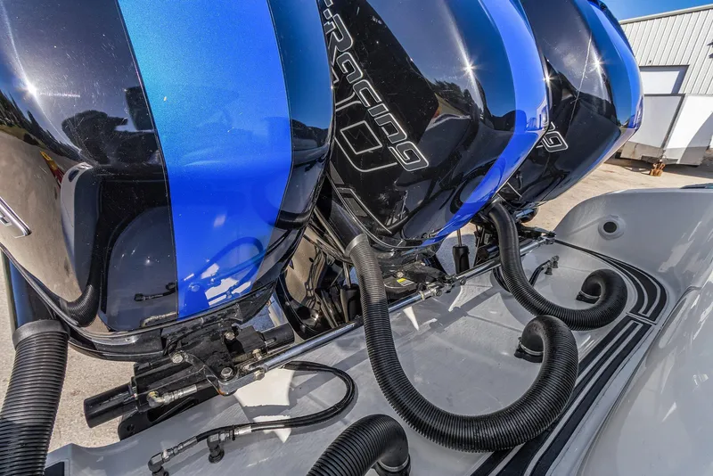 Slide: The Image of 2023 Renegade 38 Open boat with powerful outboard engines. - 25