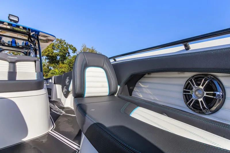 Slide: The Image of 2023 Renegade 38 Open boat interior with sleek seating and modern speaker system. - 32