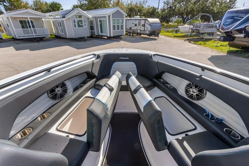 Slide: The Image of 2023 Renegade 38 Open boat interior with modern seating and speakers. - 35