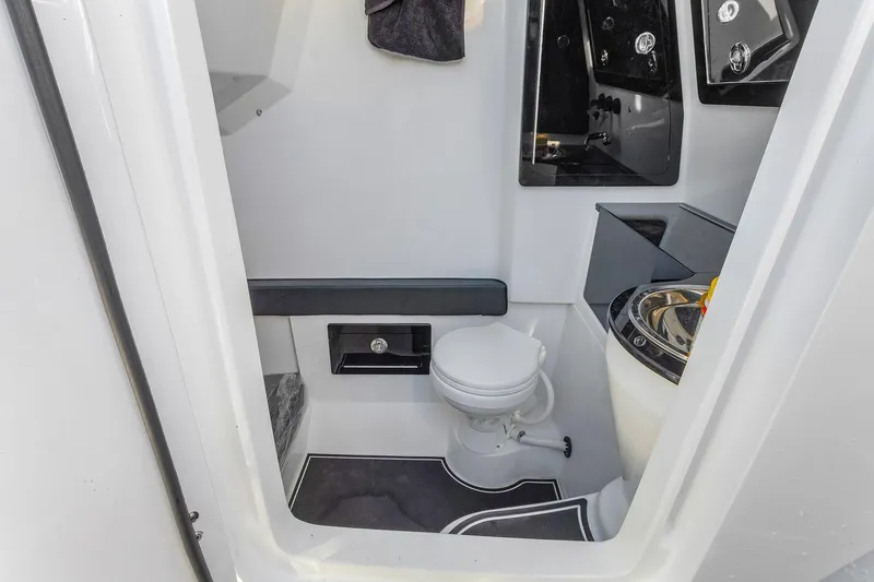 Slide: The Image of 2023 Renegade 38 Open boat interior bathroom with modern fixtures and sleek design. - 36