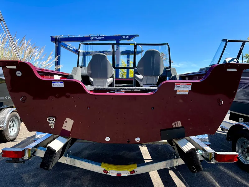 Slide: The Image of 2023 Starcraft Storm 166 DC boat on trailer, rear view. - 7