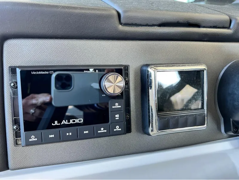 Slide: The Image of JL Audio MediaMaster 105 in 2023 Manitou LX 25 SRW dashboard. - 13