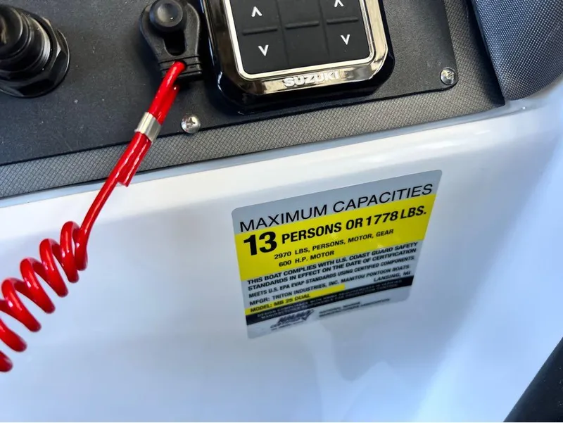 Slide: The Image of 2023 Manitou LX 25 SRW boat capacity label, 13 persons or 1778 lbs. - 34