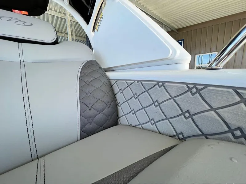Slide: The Image of 2023 Manitou LX 25 SRW interior with elegant quilted upholstery and modern design. - 6