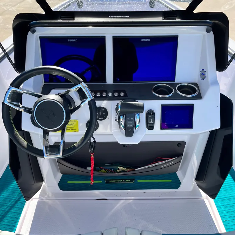 Slide: The Image of Open storage compartment on 2022 Axopar 22 T-Top x Jobe Revolve boat. - 10