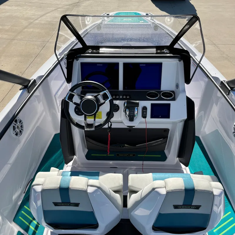 Slide: The Image of Compact bathroom in 2022 Axopar 22 T-Top x Jobe Revolve boat, featuring toilet and sink. - 9