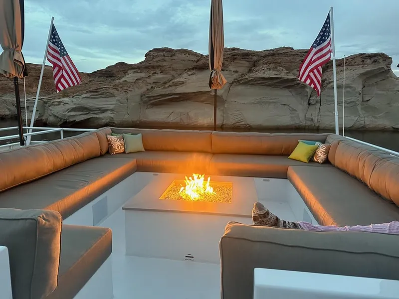 Slide: The Image of Luxurious Adonia Meticulous Share #7 houseboat with cozy fire pit and American flags, 2023 model. - 7