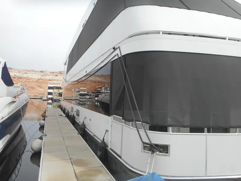 Slide: The Image of Adonia Sojourn Trip #9 houseboat docked, 2021 model. - 3