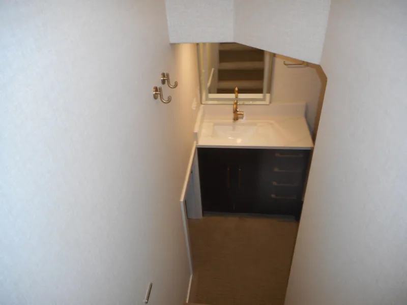 Slide: The Image of Compact bathroom with sink and gold faucet, Adonia Sojourn Trip #9, 2021. - 30