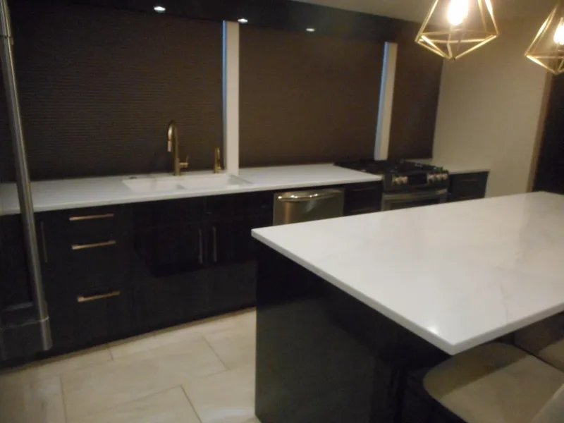 Slide: The Image of Modern kitchen with marble countertops and gold accents, Adonia Sojourn Trip #9, 2021. - 33