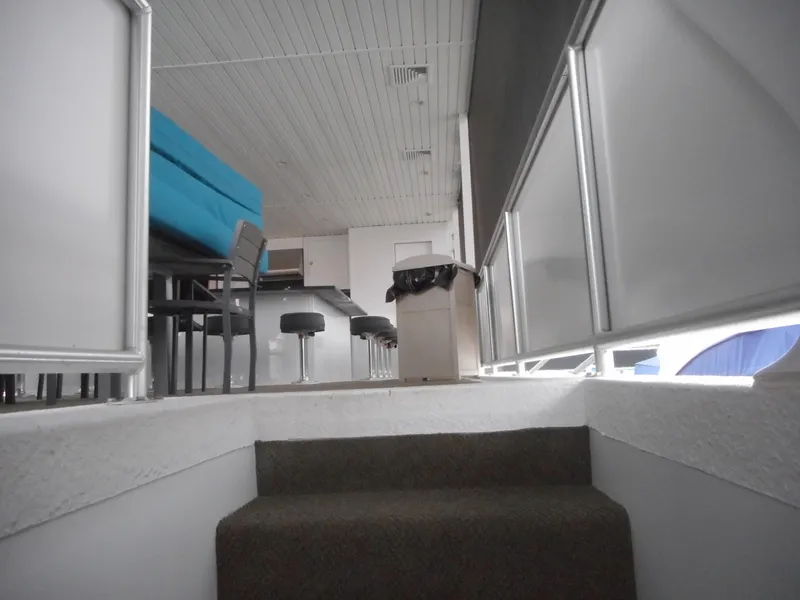 Slide: The Image of Interior of Adonia Sojourn Trip #9, 2021, featuring stairs and seating area. - 46