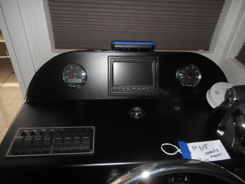 Slide: The Image of Dashboard of Adonia Sojourn Trip #9, 2021, featuring instruments and screen. - 7