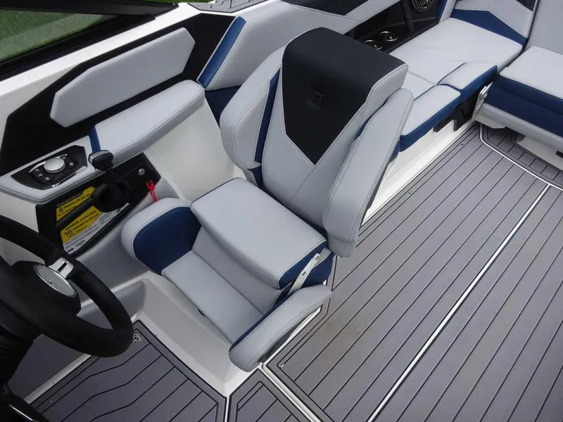 Slide: The Image of 2023 Nautique S23 boat interior with modern seating and sleek design. - 10