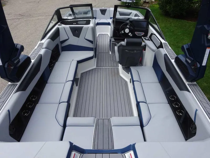 Slide: The Image of 2023 Nautique S23 boat interior with spacious seating and modern design. - 3