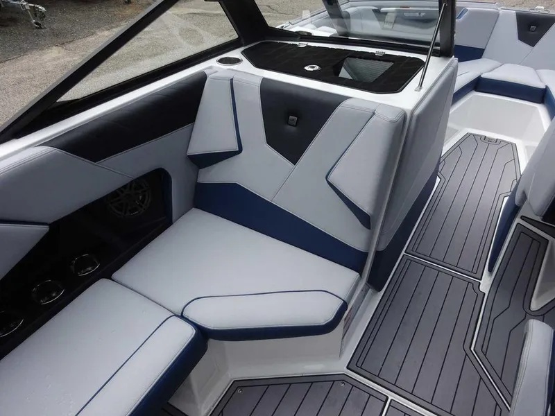 Slide: The Image of 2023 Nautique S23 boat interior with modern seating and sleek design. - 7