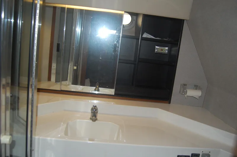 Slide: The Image of Bathroom sink area in a 1992 Bayliner 4588 Pilothouse MY yacht. - 47