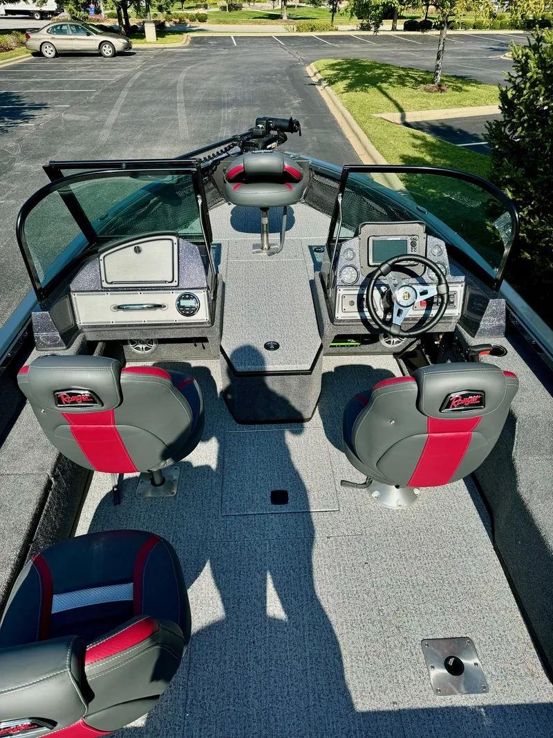 Slide: The Image of 2023 Ranger VS1882SC Angler boat interior with modern dashboard and seating. - 3