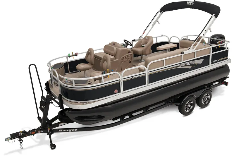 Slide: The Image of 2023 Ranger Reata 200F pontoon boat on trailer, parked outdoors. - 2