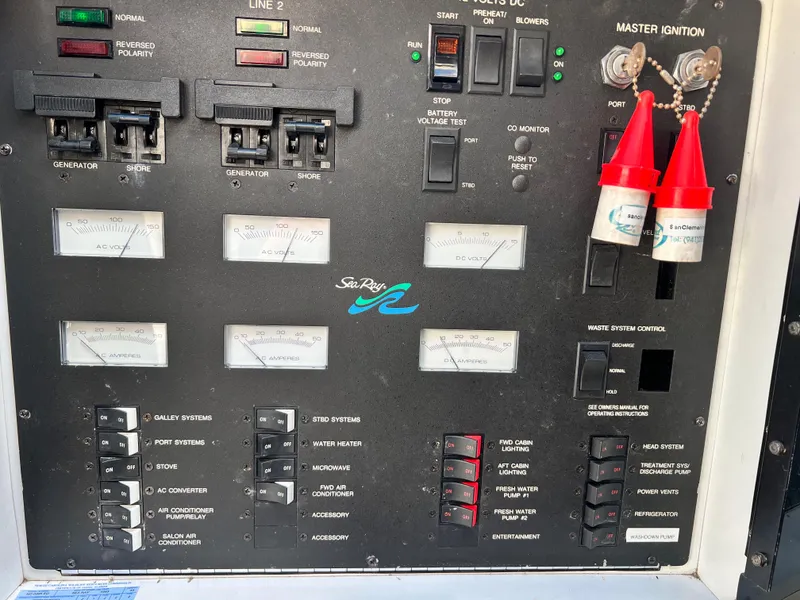 Slide: The Image of Control panel of a 1993 Sea Ray 440 Sundancer boat. - 33