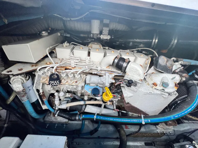 Slide: The Image of Engine compartment of a 1993 Sea Ray 440 Sundancer boat. - 36