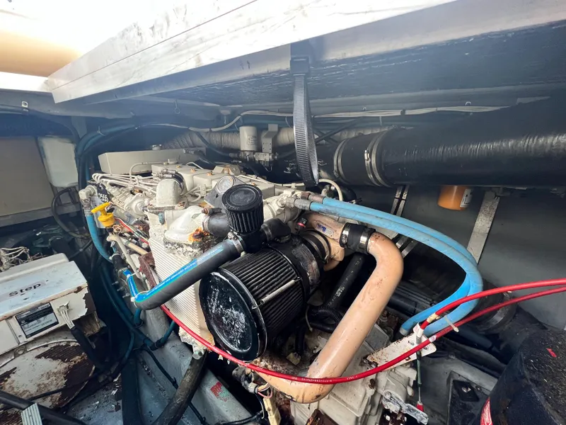 Slide: The Image of Engine compartment of a 1993 Sea Ray 440 Sundancer boat. - 38