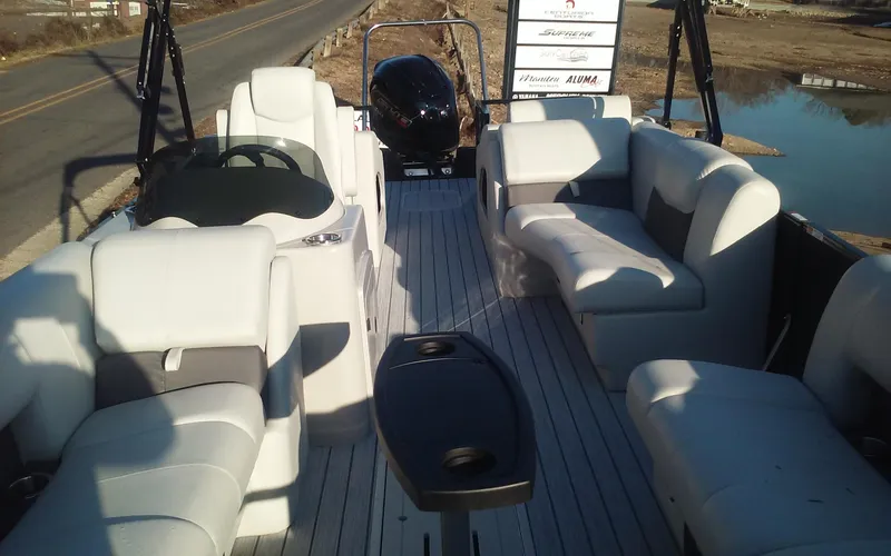 Slide: The Image of 2023 SunCatcher Fusion 324 SS pontoon boat with spacious seating and modern design. - 10