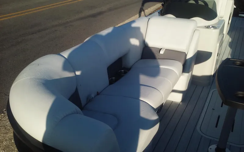 Slide: The Image of 2023 SunCatcher Fusion 324 SS boat with plush seating on deck. - 11