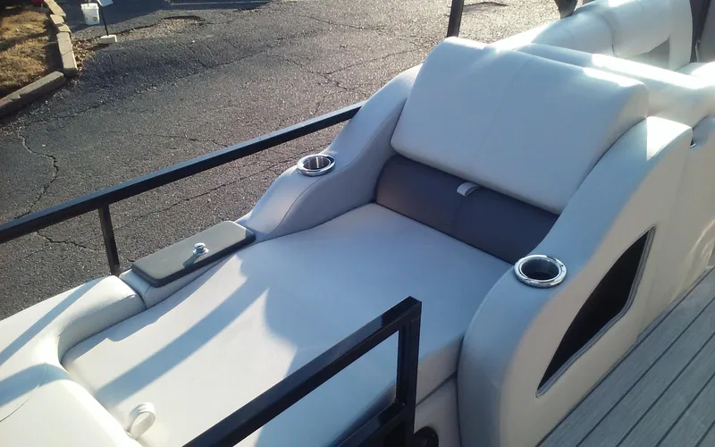 Slide: The Image of 2023 SunCatcher Fusion 324 SS boat with luxurious seating and cup holders. - 17