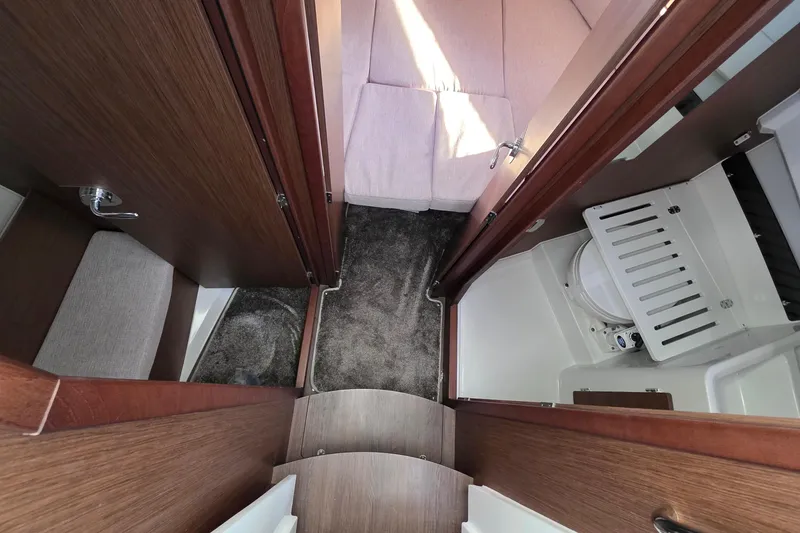 Slide: The Image of 2024 Jeanneau NC 895 Sport interior with cozy cabin and modern bathroom. - 38