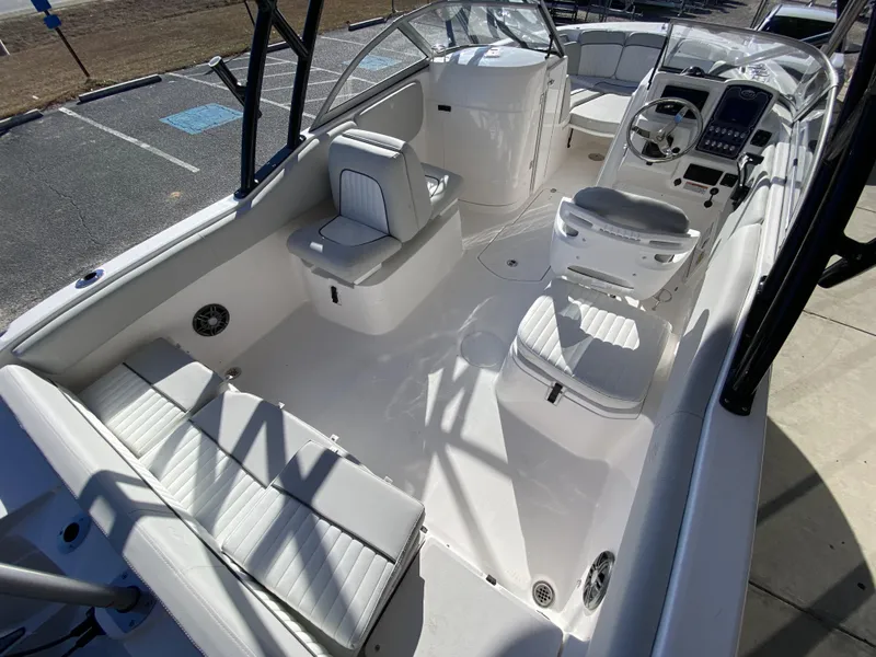 Slide: The Image of 2023 Sea Fox 226 Traveler boat interior with seating and console. - 10