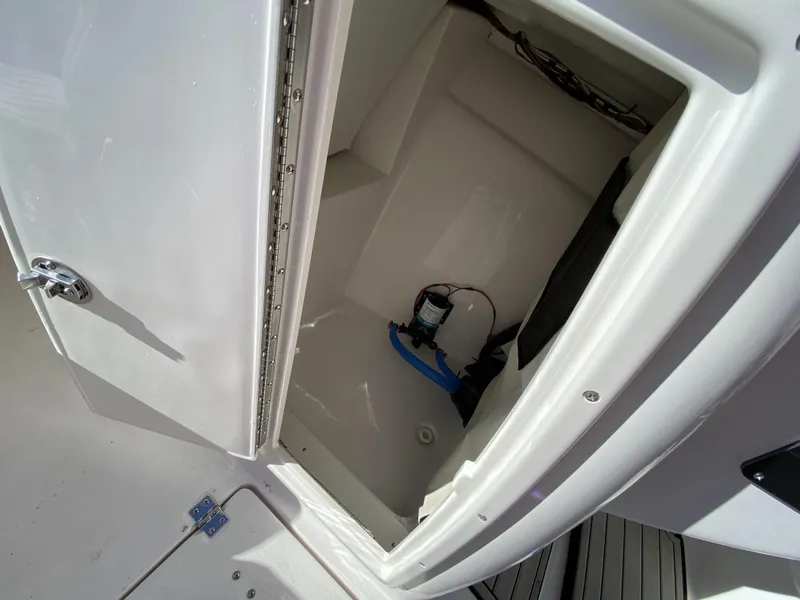 Slide: The Image of Open storage compartment on a 2023 Sea Fox 226 Traveler boat. - 17