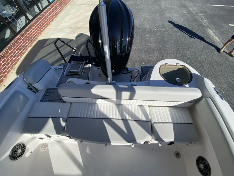 Slide: The Image of 2023 Sea Fox 226 Traveler boat interior with seating and outboard motor. - 18