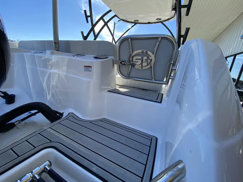 Slide: The Image of 2023 Sea Fox 226 Traveler boat interior with seating and deck. - 8