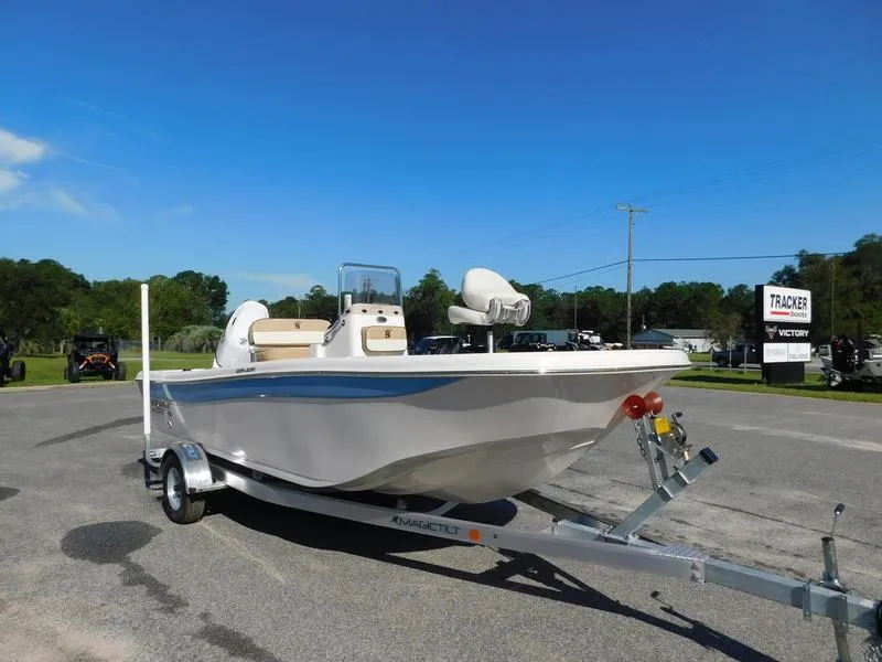 Slide: The Image of 2023 Carolina Skiff 19 Ultra Elite boat on trailer in parking lot. - 3
