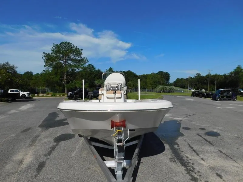 Slide: The Image of 2023 Carolina Skiff 19 Ultra Elite boat on a trailer, front view. - 7