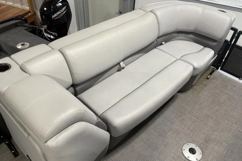 Slide: The Image of Luxurious seating on 2023 Regency 230 DL3 boat with Mercury engine. - 13