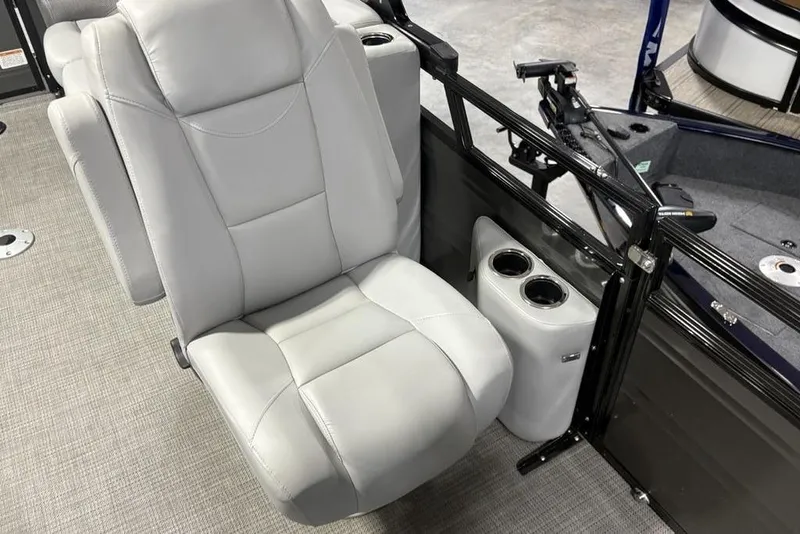 Slide: The Image of 2023 Regency 230 DL3 boat seat with cup holders, featuring sleek design and comfortable upholstery. - 18