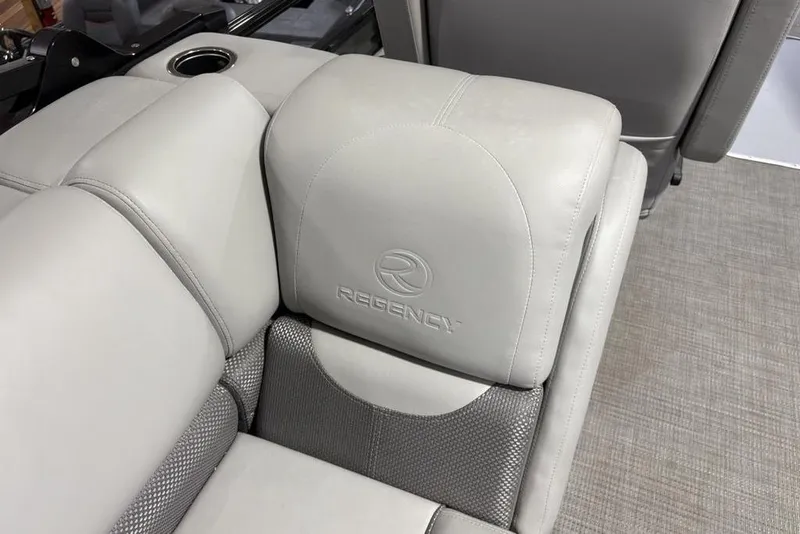 Slide: The Image of Luxurious seating of 2023 Regency 230 DL3 boat with embossed logo. - 38