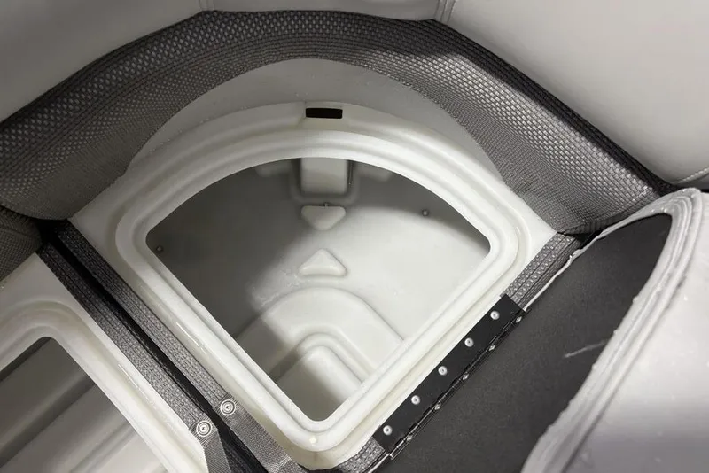 Slide: The Image of Storage compartment in 2023 Regency 230 DL3 boat, featuring durable interior design. - 44