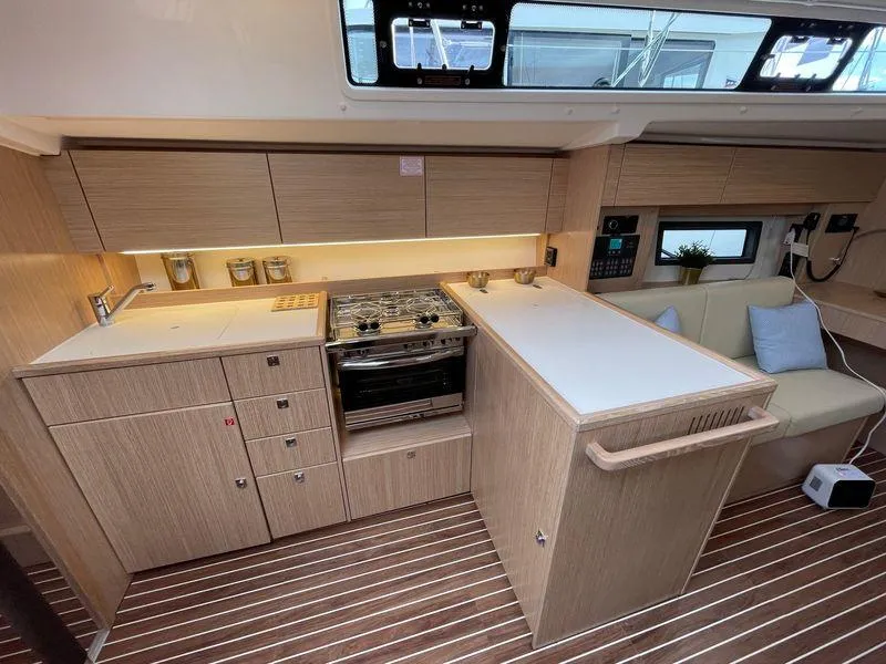 Slide: The Image of Modern kitchen interior of 2023 Bavaria C38 yacht with sleek cabinetry and appliances. - 19