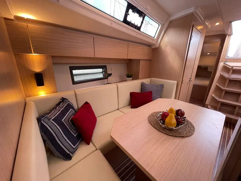 Slide: The Image of Luxurious interior of 2023 Bavaria C38 yacht with cozy seating and elegant decor. - 25