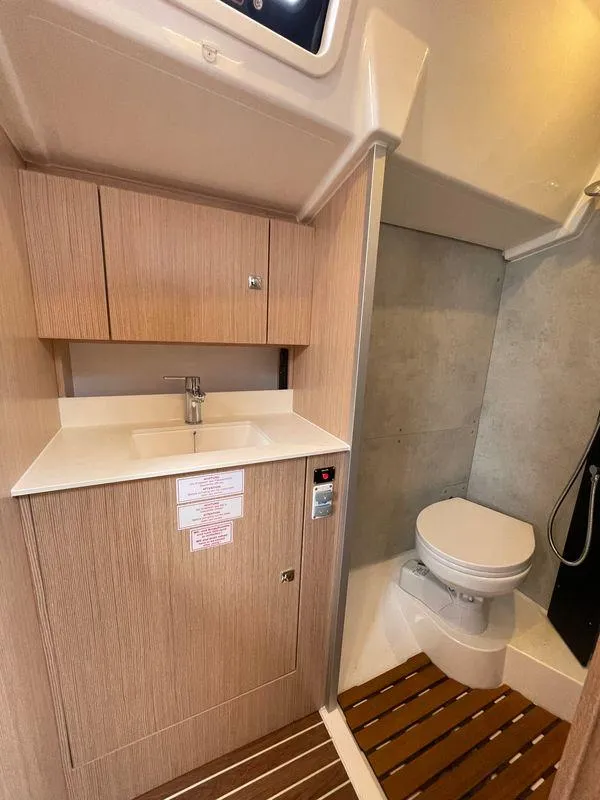 Slide: The Image of 2023 Bavaria C38 yacht bathroom with modern sink and toilet. - 29