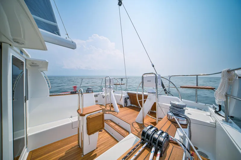 Slide: The Image of Modern Tartan 455 sailboat deck with ocean view, 2025 model. - 12
