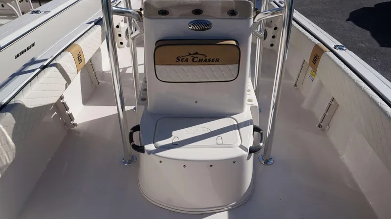 Slide: The Image of 2023 Carolina Skiff 21 Ultra Elite boat interior with "Sea Chaser" branding. - 7