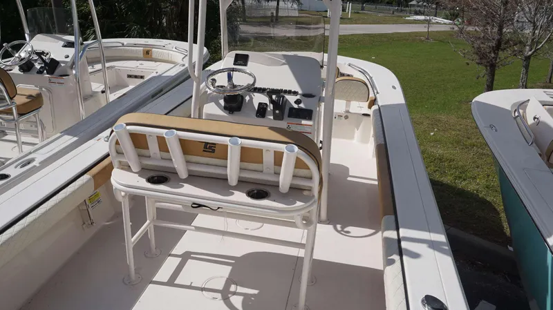 Slide: The Image of 2023 Carolina Skiff 24 Ultra Elite boat interior with helm and seating. - 14