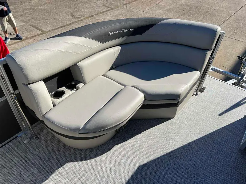 Slide: The Image of 2023 South Bay 220CR LE 2.0 boat seating area with cup holders. - 3