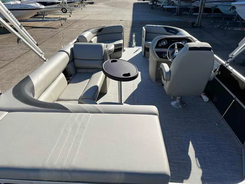 Slide: The Image of 2023 South Bay 220CR LE 2.0 pontoon boat interior with seating and helm. - 9